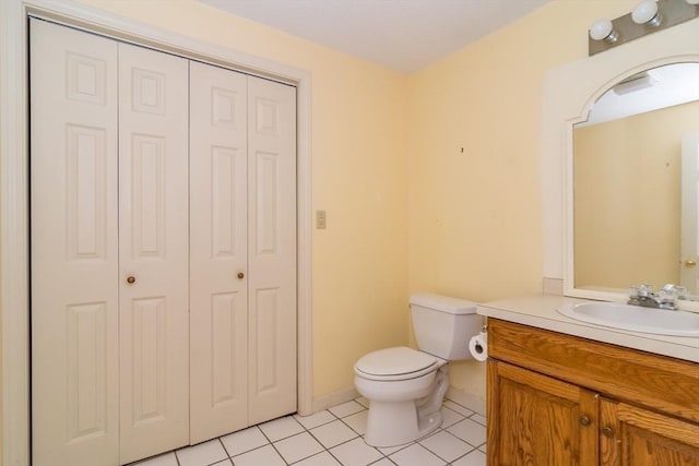 17 Harbor Hl Unit 17, Bourne, MA 02532 - bathroom with a closet, vanity, and tile patterned floors