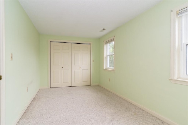 17 Harbor Hl Unit 17, Bourne, MA 02532 - unfurnished bedroom featuring carpet floors and a closet