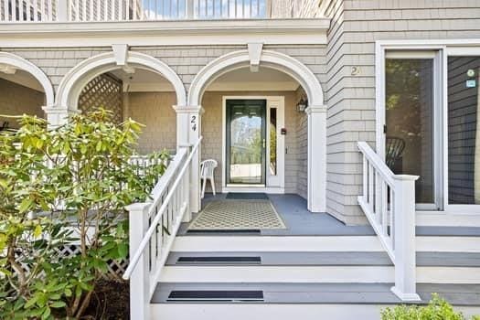 doorway to property with a porch