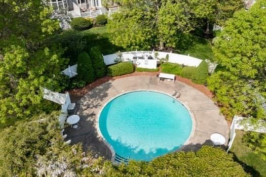 view of pool with a fenced in pool