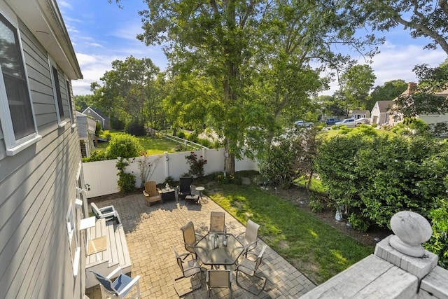 28 Chestnut St, Falmouth, MA 02536 - fenced backyard with a patio area