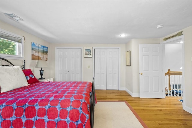28 Chestnut St, Falmouth, MA 02536 - bedroom with multiple closets, wood finished floors, and recessed lighting