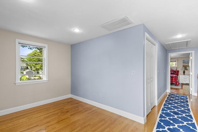 28 Chestnut St, Falmouth, MA 02536 - spare room with attic access, light wood-style floors, and recessed lighting