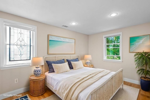 28 Chestnut St, Falmouth, MA 02536 - bedroom with wood finished floors and recessed lighting