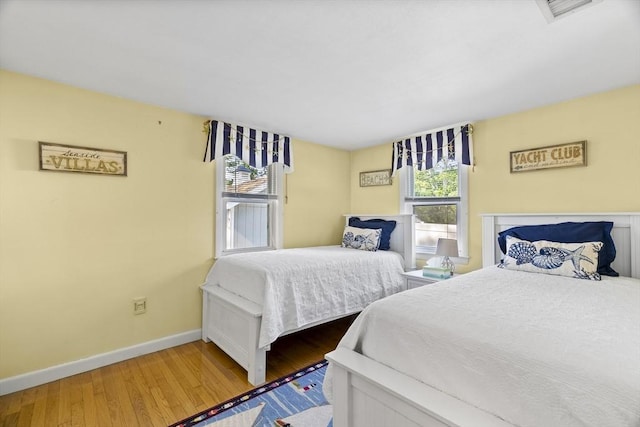 28 Chestnut St, Falmouth, MA 02536 - bedroom featuring baseboards and wood finished floors