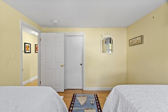 28 Chestnut St, Falmouth, MA 02536 - bedroom with wood finished floors and a closet