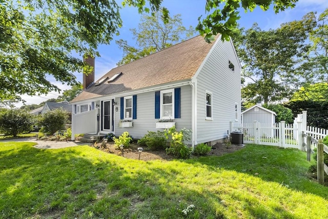 28 Chestnut St, Falmouth, MA 02536 - view of front facade featuring a chimney, roof with shingles, and a gate