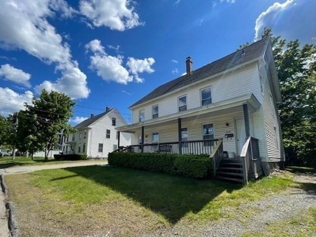 268-270 Providence Rd, Grafton, MA 01560 - back of house with covered porch, a yard, and a chimney