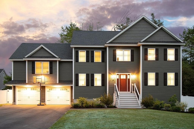 32 Gilman Rd, Billerica, MA 01862 - view of front facade featuring an attached garage, driveway, and a shingled roof