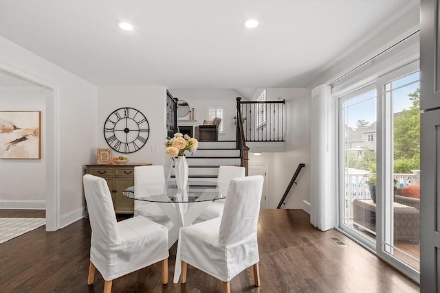 32 Gilman Rd, Billerica, MA 01862 - dining space with dark wood-type flooring, recessed lighting, baseboards, and stairway