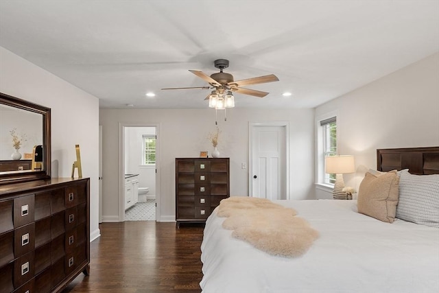 32 Gilman Rd, Billerica, MA 01862 - bedroom featuring dark wood-style floors, multiple windows, recessed lighting, ensuite bathroom, and baseboards