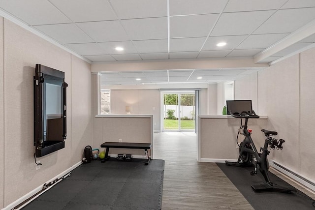 32 Gilman Rd, Billerica, MA 01862 - workout area with baseboard heating, baseboards, a paneled ceiling, wood finished floors, and recessed lighting