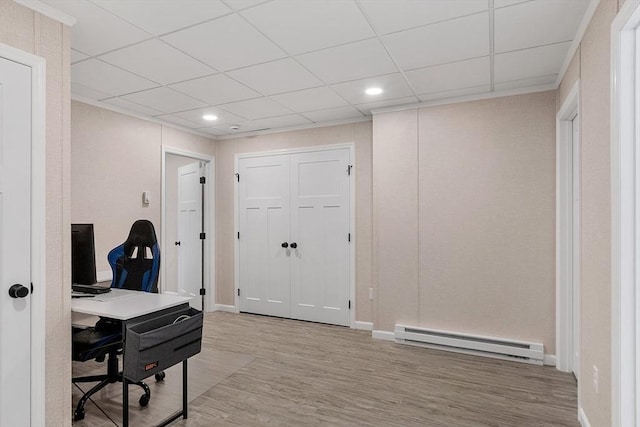 32 Gilman Rd, Billerica, MA 01862 - office area featuring a baseboard heating unit, light wood finished floors, recessed lighting, baseboards, and a paneled ceiling