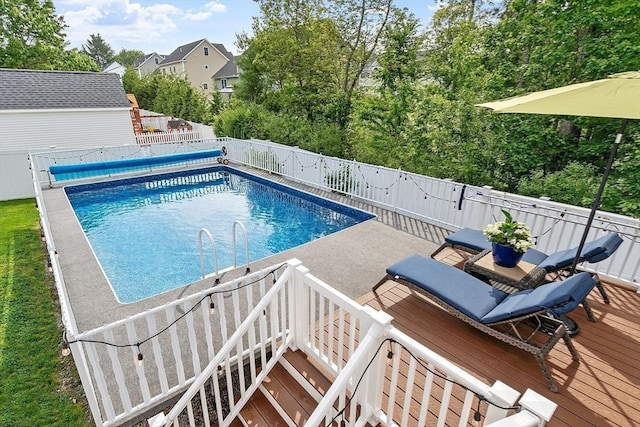 32 Gilman Rd, Billerica, MA 01862 - view of pool featuring a fenced backyard and a wooden deck