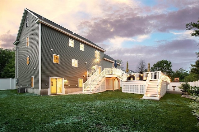 32 Gilman Rd, Billerica, MA 01862 - back of house with stairway, central AC unit, and a deck