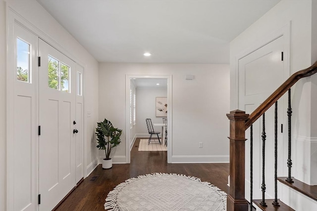 32 Gilman Rd, Billerica, MA 01862 - entrance foyer featuring wood finished floors, recessed lighting, baseboards, and stairs