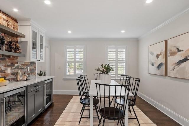 32 Gilman Rd, Billerica, MA 01862 - dining space with beverage cooler, recessed lighting, baseboards, dark wood-style floors, and crown molding