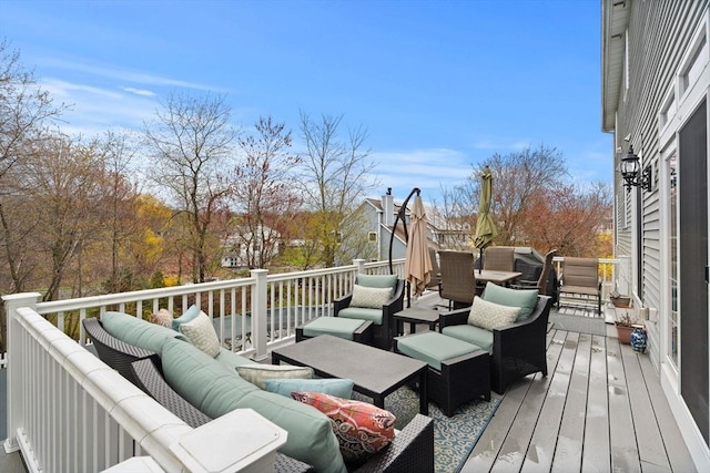 wooden deck with outdoor lounge area