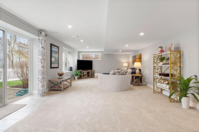 living area featuring carpet, recessed lighting, and baseboards
