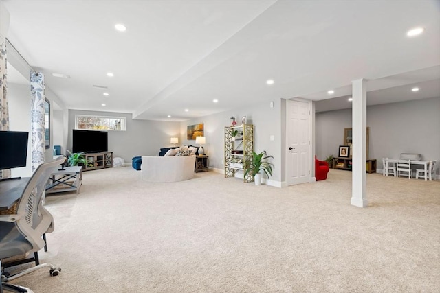 living room featuring baseboards, recessed lighting, and carpet