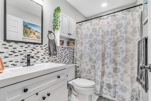 124 Tennis Plaza Rd Unit 2, Dracut, MA 01826 - bathroom featuring vanity, tasteful backsplash, and curtained shower