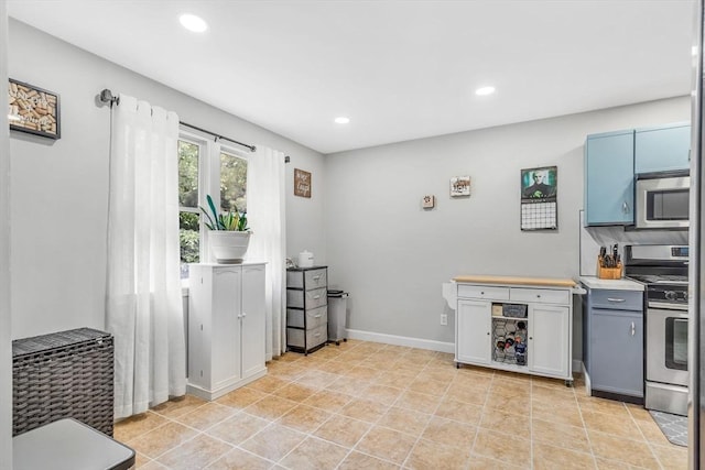 124 Tennis Plaza Rd Unit 2, Dracut, MA 01826 - kitchen featuring appliances with stainless steel finishes, recessed lighting, and light countertops