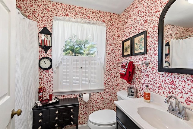 39 Bennets Neck Dr, Bourne, MA 02559 - full bathroom with wallpapered walls, vanity, and a shower with curtain