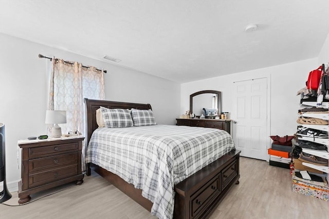 bedroom featuring light hardwood / wood-style floors