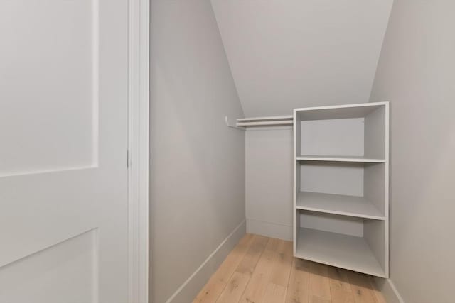 126 Central St Unit 2, Somerville, MA 02145 - spacious closet with light wood-style flooring and vaulted ceiling