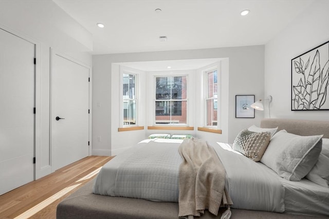 bedroom featuring light wood-type flooring