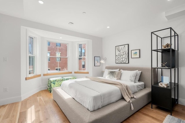 bedroom featuring light wood-type flooring