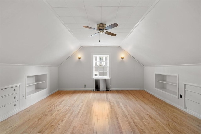 31 Whitman Ave, Melrose, MA 02176 - bonus room featuring built in features, radiator, light wood-type flooring, ceiling fan, and lofted ceiling