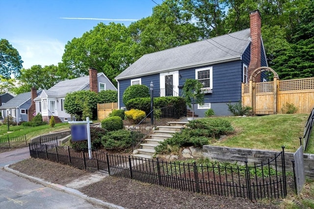 31 Whitman Ave, Melrose, MA 02176 - bungalow-style house featuring a chimney