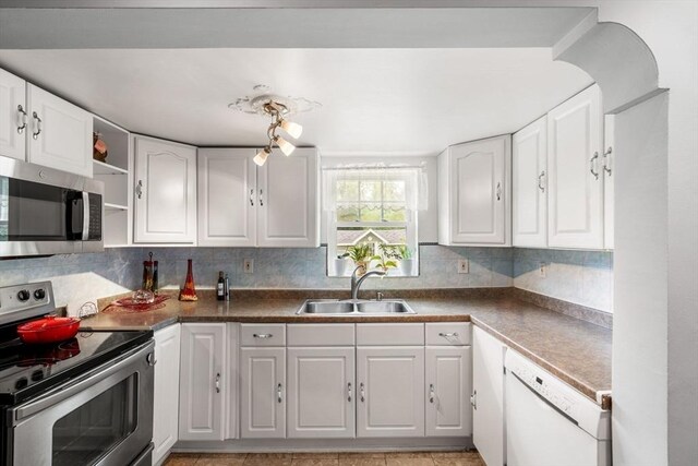31 Rydberg Ter, Auburn, MA 01607 - kitchen featuring appliances with stainless steel finishes, a sink, white cabinets, and open shelves