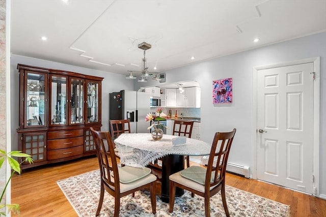 31 Rydberg Ter, Auburn, MA 01607 - dining area with a baseboard heating unit, recessed lighting, and light wood-type flooring