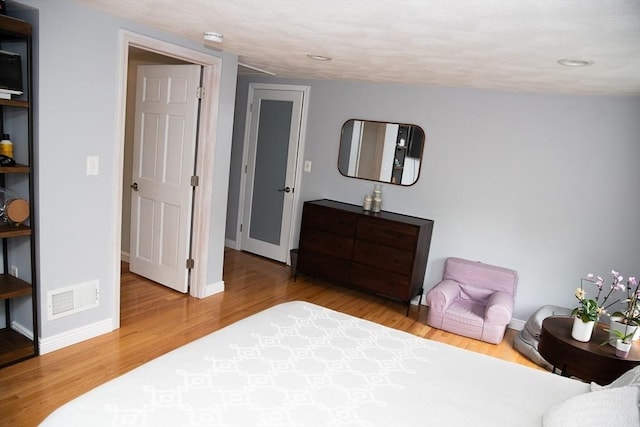 49 Tremont St, Billerica, MA 01821 - bedroom with wood finished floors, baseboards, and recessed lighting