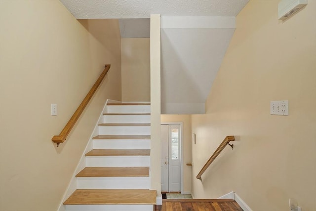 stairs featuring baseboards