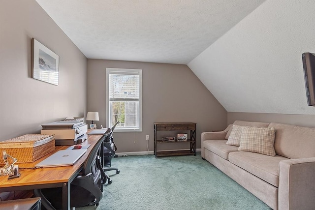 office with carpet, vaulted ceiling, baseboards, and a textured ceiling