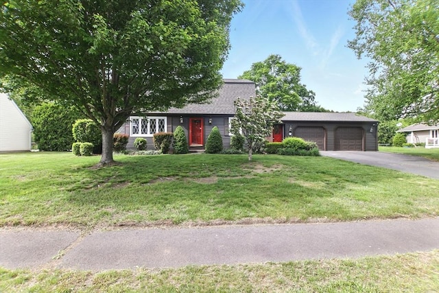 14 Provin Mountain Dr, Agawam, MA 01030 - colonial inspired home with an attached garage, asphalt driveway, a front yard, and a shingled roof