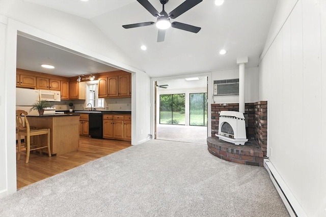 14 Provin Mountain Dr, Agawam, MA 01030 - kitchen featuring light carpet, white appliances, dark countertops, a baseboard heating unit, and open floor plan