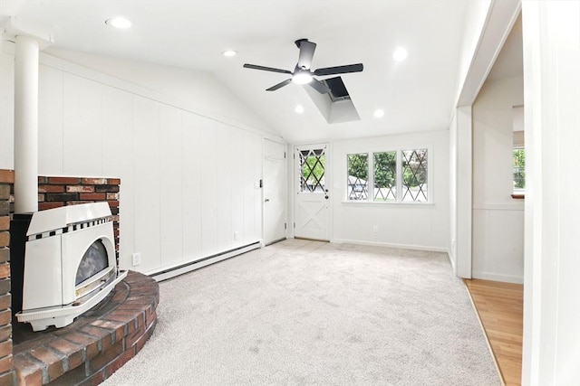 14 Provin Mountain Dr, Agawam, MA 01030 - unfurnished living room featuring a baseboard radiator, ceiling fan, vaulted ceiling, recessed lighting, and light wood finished floors