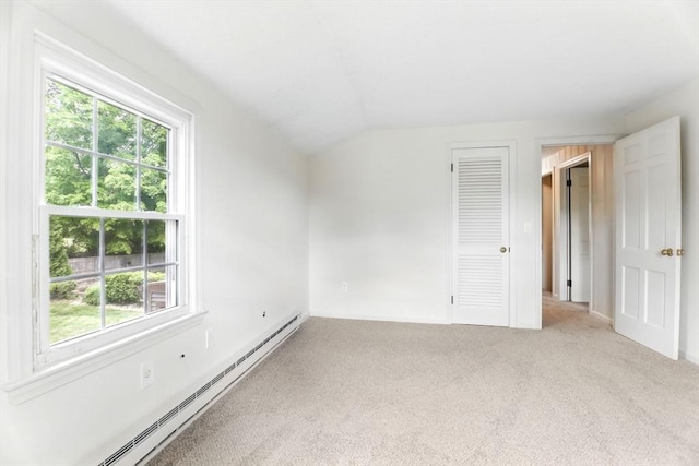 14 Provin Mountain Dr, Agawam, MA 01030 - unfurnished bedroom with a baseboard heating unit, multiple windows, carpet, and lofted ceiling