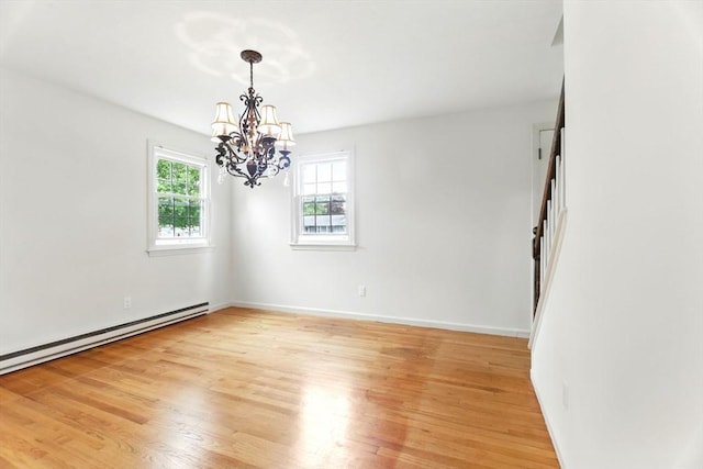 14 Provin Mountain Dr, Agawam, MA 01030 - spare room with light wood finished floors, a chandelier, baseboards, and baseboard heating