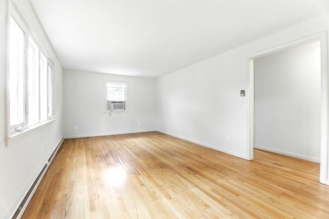 14 Provin Mountain Dr, Agawam, MA 01030 - unfurnished room featuring light wood finished floors, baseboards, baseboard heating, and cooling unit