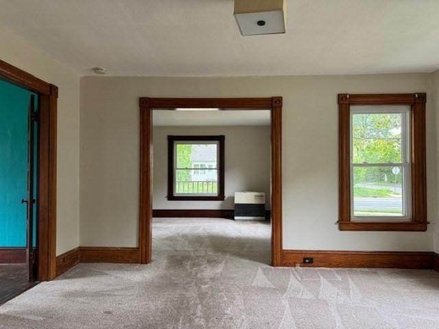40 Allen St, Greenfield, MA 01301 - hallway featuring carpet flooring, plenty of natural light, and baseboards