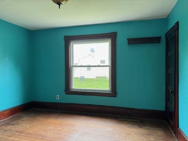 40 Allen St, Greenfield, MA 01301 - empty room with hardwood / wood-style flooring and baseboards