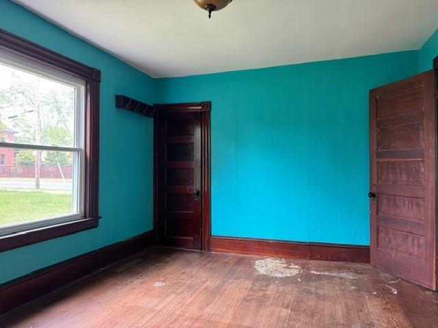 40 Allen St, Greenfield, MA 01301 - unfurnished room with wood finished floors and baseboards