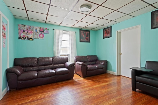 66 Adams St, Revere, MA 02151 - living area featuring a paneled ceiling and light wood-style flooring