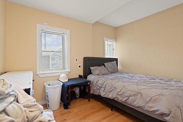 66 Adams St, Revere, MA 02151 - bedroom featuring multiple windows and wood finished floors