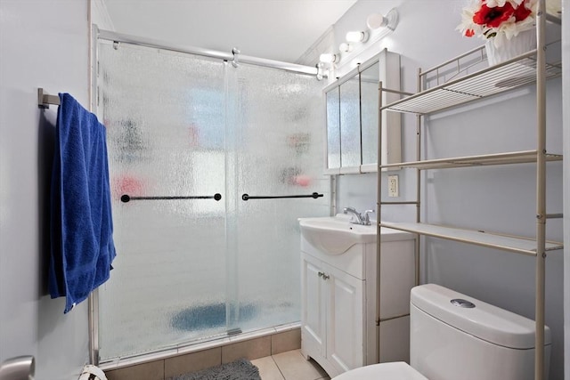66 Adams St, Revere, MA 02151 - bathroom with vanity, a stall shower, and tile patterned floors